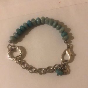 Brighton’s “Live Laugh Love” turquoise-colored stone bracelet.